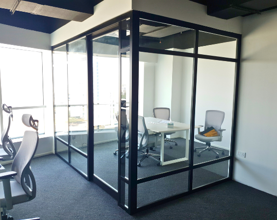 Frameless glass cabin meeting room installed in corporate office