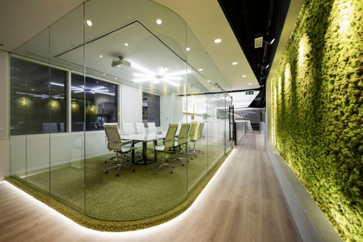 Demountable aluminium framed office glass wall partitions in commercial workspace